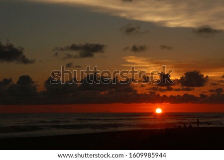 Picture Sunset in Parangtritis Beach Yogyakarta