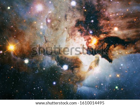 Stars of a planet and galaxy in a free space. Stardust and bright shining stars. Elements of this image furnished by NASA.