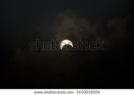A solar eclipse occurs when a portion of the Earth is engulfed in a shadow cast by the Moon which fully or partially blocks sunlight. This occurs when the Sun, Moon and Earth are aligned.(26/12/19)