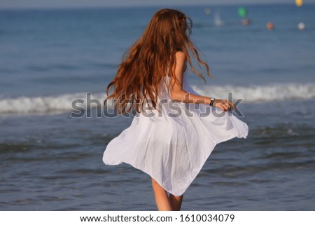 teen girl on the spain beach smile