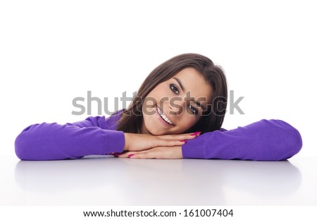 Beautiful woman resting and leaning at desk 