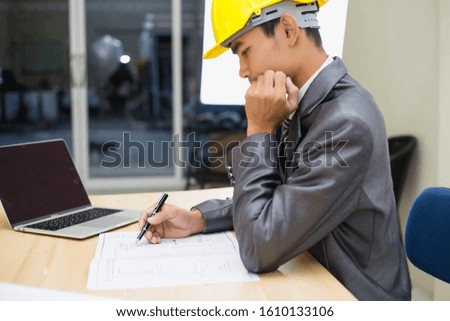 Engineer checks shipment of chemicals at oil and gas industry pipeline job site stock photo