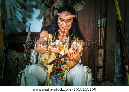 native Americans.portrait of Americans Indian man. Royalty-Free Stock Photo #1610163160
