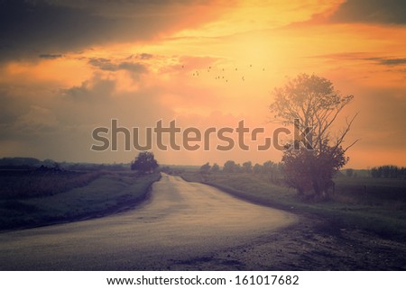 Vintage photo of traffic road in sunset Royalty-Free Stock Photo #161017682