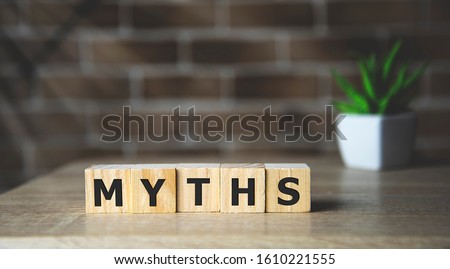 Myths word on wooden cubes. Myths concept. Royalty-Free Stock Photo #1610221555