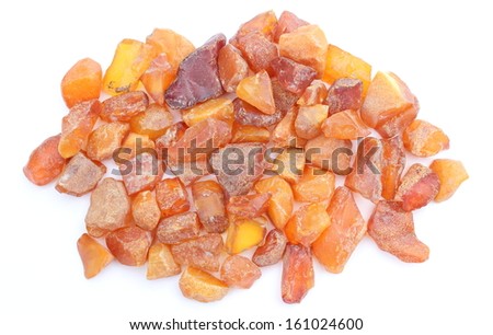 Raw amber from coast of Baltic sea isolated on white background