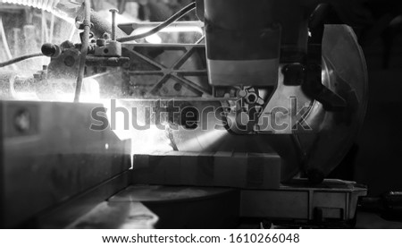 workshop with tools and electric saws in the process of manufacturing parts
