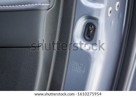 Child lock button on rear door is protect children from opening the door from inside of car.