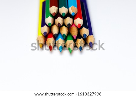 color pencils stacked with withe space for custom text, for powerpoint presentations or websites