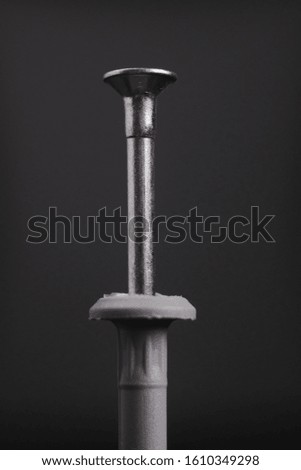 dowel for construction on a dark background