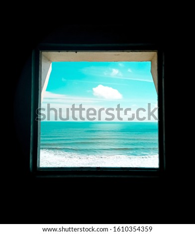 The lighthouse window that leads to the sea