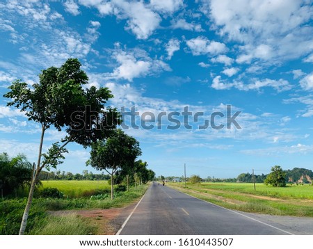 The country road on the way to Khao Chang Cave in Na Muen Si Subdistrict, Trang Province, the sky is beautiful