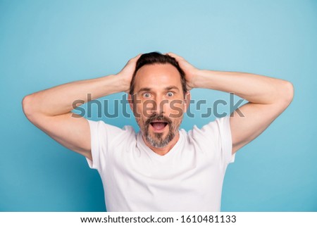 Close-up portrait of his he nice attractive overwhelmed shocked guy freelancer great cool news facial expression isolated on bright vivid shine vibrant teal green blue turquoise color background