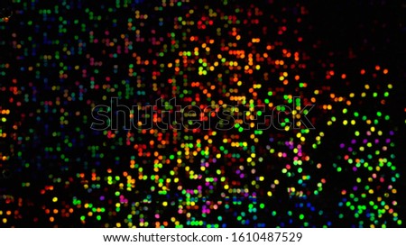 Holographic multicolor digital mosaic pixels. Abstract holiday background. The texture of a real surface