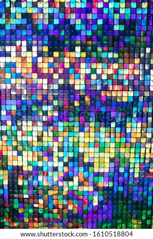 background of small multi-colored squares shimmers and whitewashes