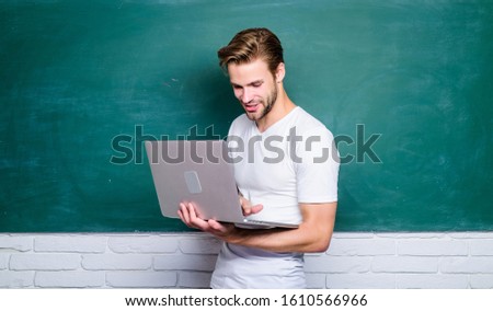 Online communications. School teacher with laptop. Handsome man use modern technology. Digital technology. Programming web development. Digital concept. Student learn digital world. Surfing internet.