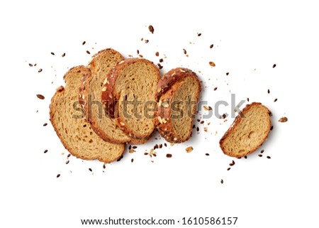A loaf of sliced bread with oats and flax seeds Royalty-Free Stock Photo #1610586157