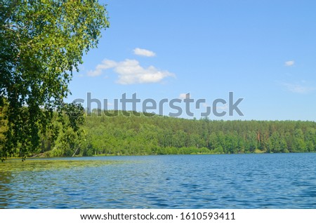 Beautiful nature lake blue water Royalty-Free Stock Photo #1610593411