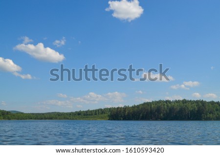Beautiful nature lake blue water Royalty-Free Stock Photo #1610593420