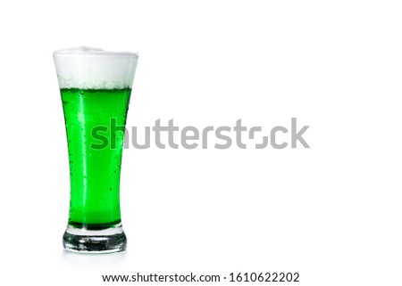Traditional St Patrick's Day green beer isolated on white background. Copy space
