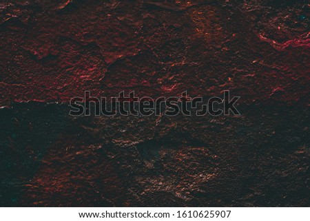 Copper Rock pile. Rust texture. Rock surface with cracks. Brown Painted wall. Dark Backgrounds. Abstract Structure. Rock texture. Stone background. Rock background. Rough structure mineral. 