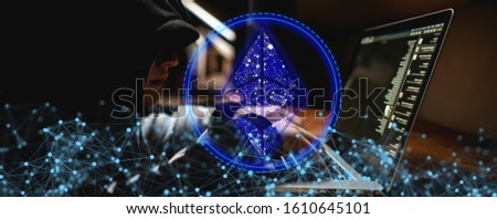 Anonymous person hacker with crypto currency, internet crime, cryptojacking
