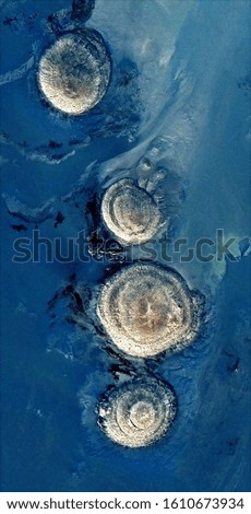 family, vertical abstract photography of the deserts of Africa from the air, aerial view of desert landscapes, Genre: Abstract Naturalism, from the abstract to the figurative, 