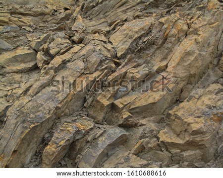     Mountain texture. Close-up. Light brown stone background. Sandstone texture. Sandy colors grunge background.                           