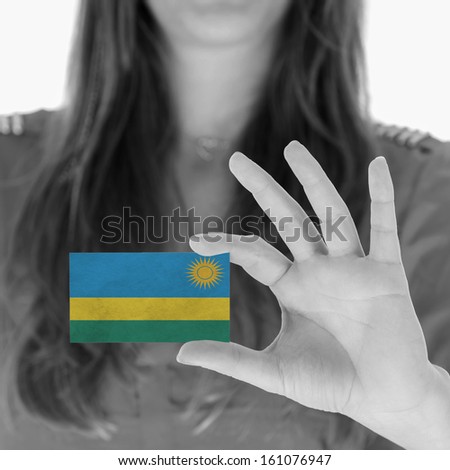 Woman in showing a business card, Rwanda