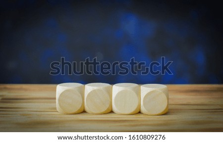 wooden cubes on table background, for including a business messa