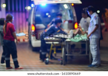 patient emergency with team transfer from ambulance ,blur Royalty-Free Stock Photo #1610890669
