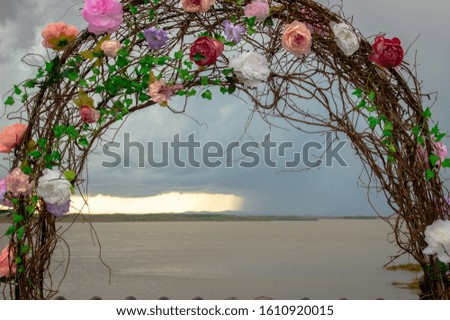 Flower arch with sky in the background. wedding decorations.