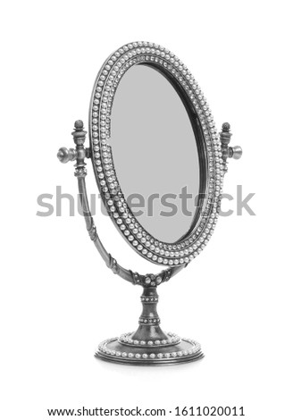 Vintage desk mirror with stand isolated on white