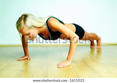 Young beautiful woman during fitness time and exercising Royalty-Free Stock Photo #1611023