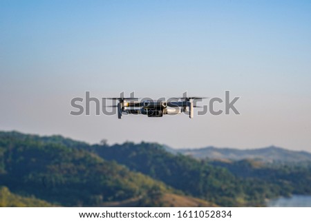 The drone flying in the sky