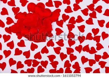 Background of small red hearts on a white background