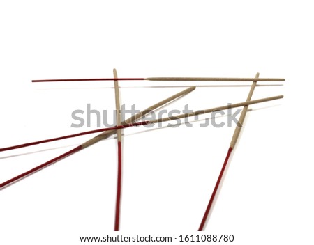 incense sticks isolated on white background. 

