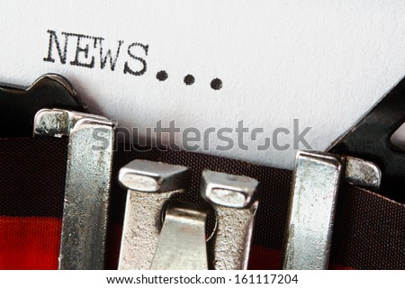 type spelling the word news on a vintage typewriter, great concept for blogs, journalism, news, newsletters, press releases, authors and the mass media Royalty-Free Stock Photo #161117204