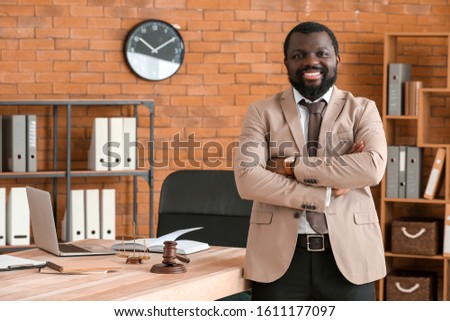 African-American lawyer in his office