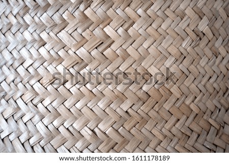 Wicker basket pattern with blur effect. Abstract background and texture for design.