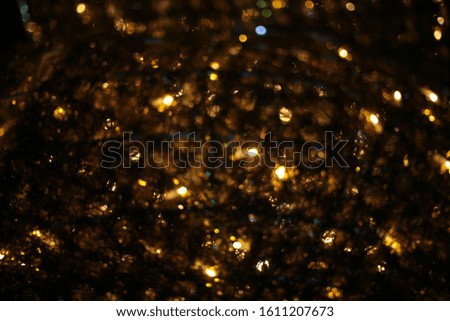 festive sparkler and many sparks macro photo bokeh background Christmas and New Year