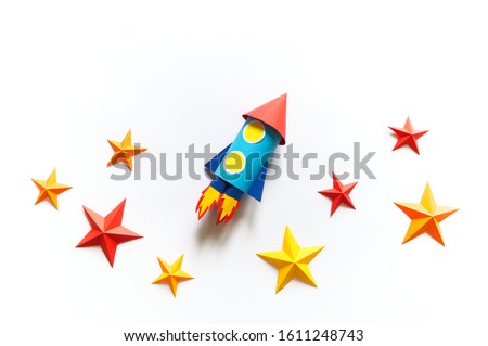 Paper rocket. Origami craft stars. Child play technology innovation.