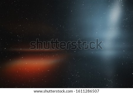 Red and blue abstract background. Imitation of an old film photo. Vintage texture. 00s. redaction.  Lens flare and heavy grain. 70s Royalty-Free Stock Photo #1611286507