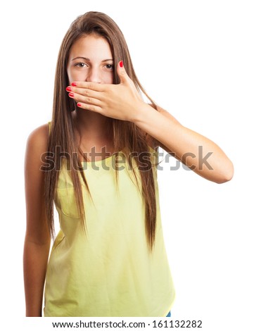 young woman covering her mouth with her hand isolated on white