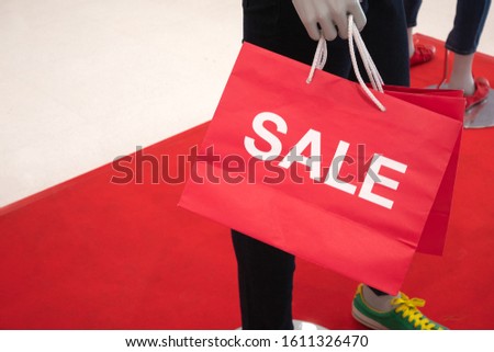 on sale,Red paper bags on sale at the mall