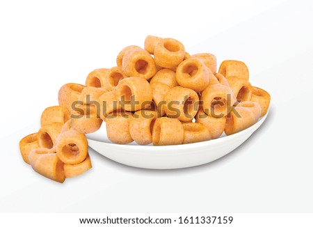 Fried and Spicy Tasty yellow salted pipe, Masala Cherry Ball Sncaks, Most famous and delicious wheat flour snack Children love them very much Snacks or Fryums (Snacks Pellets) served in a white bowl. Royalty-Free Stock Photo #1611337159
