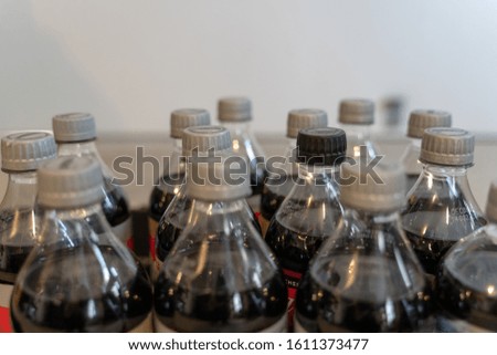 Bottles of soda together on a pallet
 Royalty-Free Stock Photo #1611373477