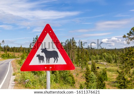 Sheep warning traffic sign along the road in Norway. Beware of the sheep!
