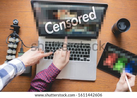 the modern device gadget screen censored, covered by pixels blur