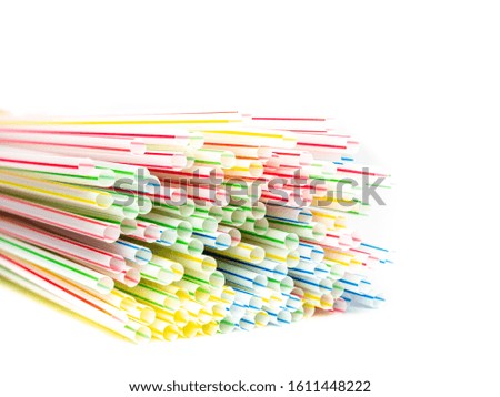 Many plastic straws isolated on white background